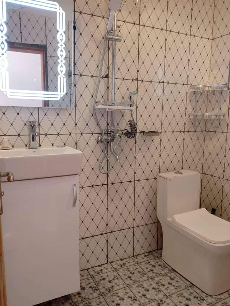 Douche carrelage losange